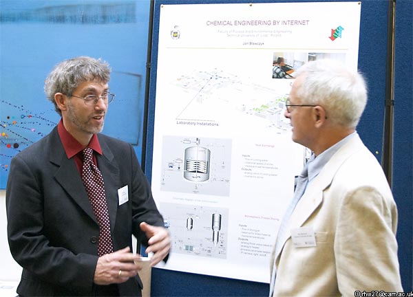 Ralf Moros talking to Jan Stawczyk at the poster session