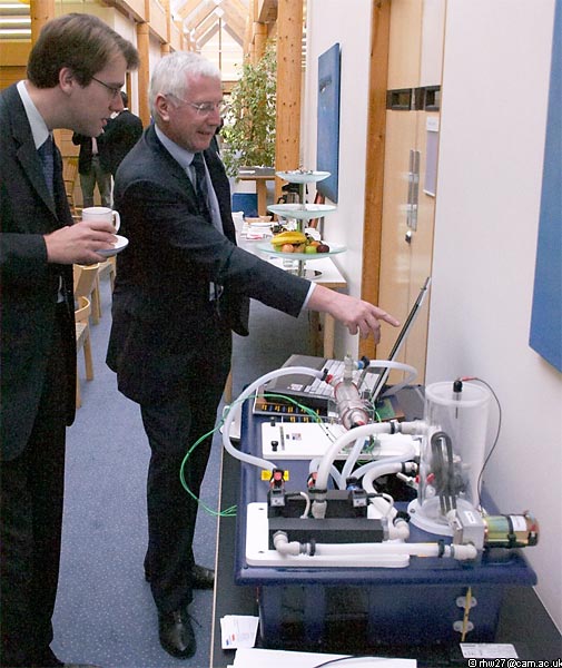 Ted Sansom explaining the Armfield remote control heat exchanger to Chris Handscomb