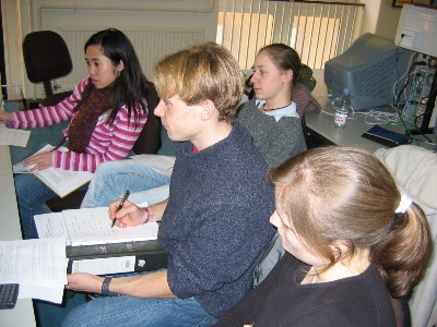 Students performing the experiment in the computer room